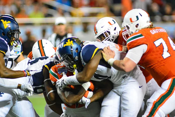 West Virginia Mountaineers Enfrentam Miami Hurricanes Durante 71St Russell Bowl — Fotografia de Stock