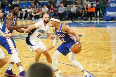 Orlando Magic 27 Aralık 2019 Cuma günü Orlando, Florida 'daki Amway Arena' da Philadelphia 76ers 'a ev sahipliği yapıyor..