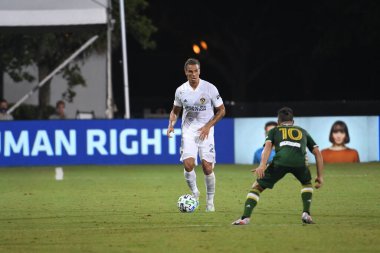 Los Angeles Galaksisi, 14 Temmuz 2020 'de Orlando Florida ABD' deki ESPN Vahşi Spor Dünyası 'nda düzenlenen MLS Sırt Turnuvası sırasında Portland Timbers ile karşı karşıya geldi.