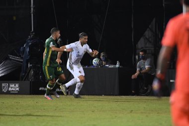 Los Angeles Galaksisi, 14 Temmuz 2020 'de Orlando Florida ABD' deki ESPN Vahşi Spor Dünyası 'nda düzenlenen MLS Sırt Turnuvası sırasında Portland Timbers ile karşı karşıya geldi..