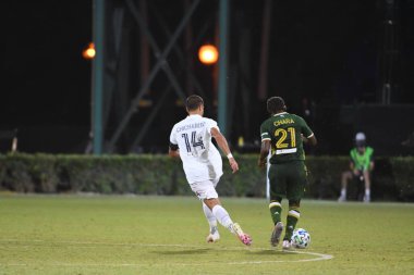 Los Angeles Galaksisi, 14 Temmuz 2020 'de Orlando Florida ABD' deki ESPN Vahşi Spor Dünyası 'nda düzenlenen MLS Sırt Turnuvası sırasında Portland Timbers ile karşı karşıya geldi.