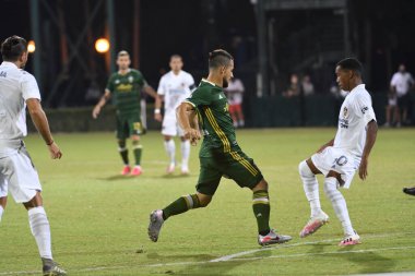 Los Angeles Galaksisi, 14 Temmuz 2020 'de Orlando Florida ABD' deki ESPN Vahşi Spor Dünyası 'nda düzenlenen MLS Sırt Turnuvası sırasında Portland Timbers ile karşı karşıya geldi.