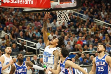 Orlando Magic 27 Aralık 2019 Cuma günü Orlando, Florida 'daki Amway Arena' da Philadelphia 76ers 'a ev sahipliği yapıyor..