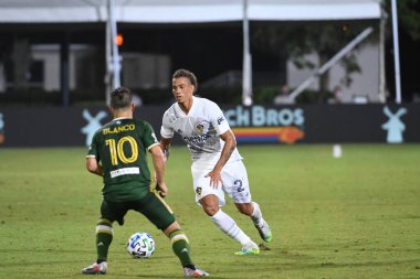 Los Angeles Galaksisi, 14 Temmuz 2020 'de Orlando Florida ABD' deki ESPN Vahşi Spor Dünyası 'nda düzenlenen MLS Sırt Turnuvası sırasında Portland Timbers ile karşı karşıya geldi.