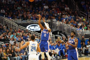 Orlando Magic 27 Aralık 2019 Cuma günü Orlando, Florida 'daki Amway Arena' da Philadelphia 76ers 'a ev sahipliği yapıyor..