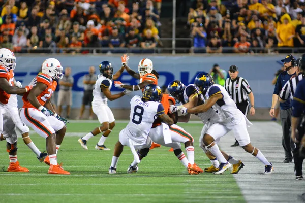 West Virginia Mountaineers Enfrentam Miami Hurricanes Durante 71St Russell Bowl — Fotografia de Stock