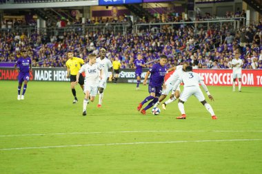 Orlando City SC, 19 Haziran 2019 Çarşamba günü Orlando 'daki Exploria Stadyumu' nda düzenlenen ABD Açık Kupası sırasında New England Devrimi 'ne ev sahipliği yaptı.