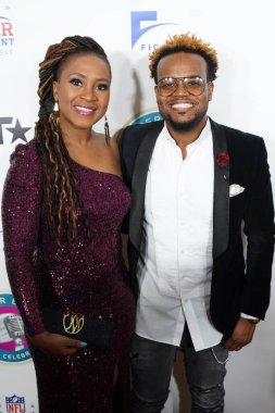 Gospel şarkıcısı Travis Greene ve eşi Jacqueline Gyamfi Greene, 30 Ocak 2020 Perşembe günü Miami Florida 'daki James L Knight Center' da düzenlenen 21. Fotoğraf: Marty Je