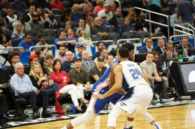 Orlando Magic 27 Aralık 2019 Cuma günü Orlando, Florida 'daki Amway Arena' da Philadelphia 76ers 'a ev sahipliği yapıyor..