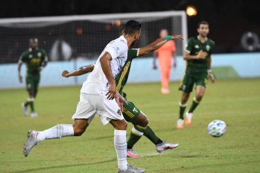 Los Angeles Galaksisi, 14 Temmuz 2020 'de Orlando Florida ABD' deki ESPN Vahşi Spor Dünyası 'nda düzenlenen MLS Sırt Turnuvası sırasında Portland Timbers ile karşı karşıya geldi.