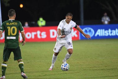 Los Angeles Galaksisi, 14 Temmuz 2020 'de Orlando Florida ABD' deki ESPN Vahşi Spor Dünyası 'nda düzenlenen MLS Sırt Turnuvası sırasında Portland Timbers ile karşı karşıya geldi..