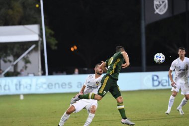 Los Angeles Galaksisi, 14 Temmuz 2020 'de Orlando Florida ABD' deki ESPN Vahşi Spor Dünyası 'nda düzenlenen MLS Sırt Turnuvası sırasında Portland Timbers ile karşı karşıya geldi.