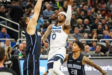 Minnesota Timberwolves oyuncusu D 'Angelo Russell 28 Şubat 2020' de Orlando Florida 'da Amway Center' da basket attı..  