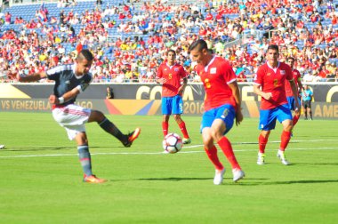 Costa Rica face Paraguay during the Copa America Centenario at the Camping World Stadium in Orlando Florida on June 4, 2016.   clipart