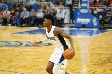 Orlando Magic 27 Aralık 2019 Cuma günü Orlando, Florida 'daki Amway Arena' da Philadelphia 76ers 'a ev sahipliği yapıyor..