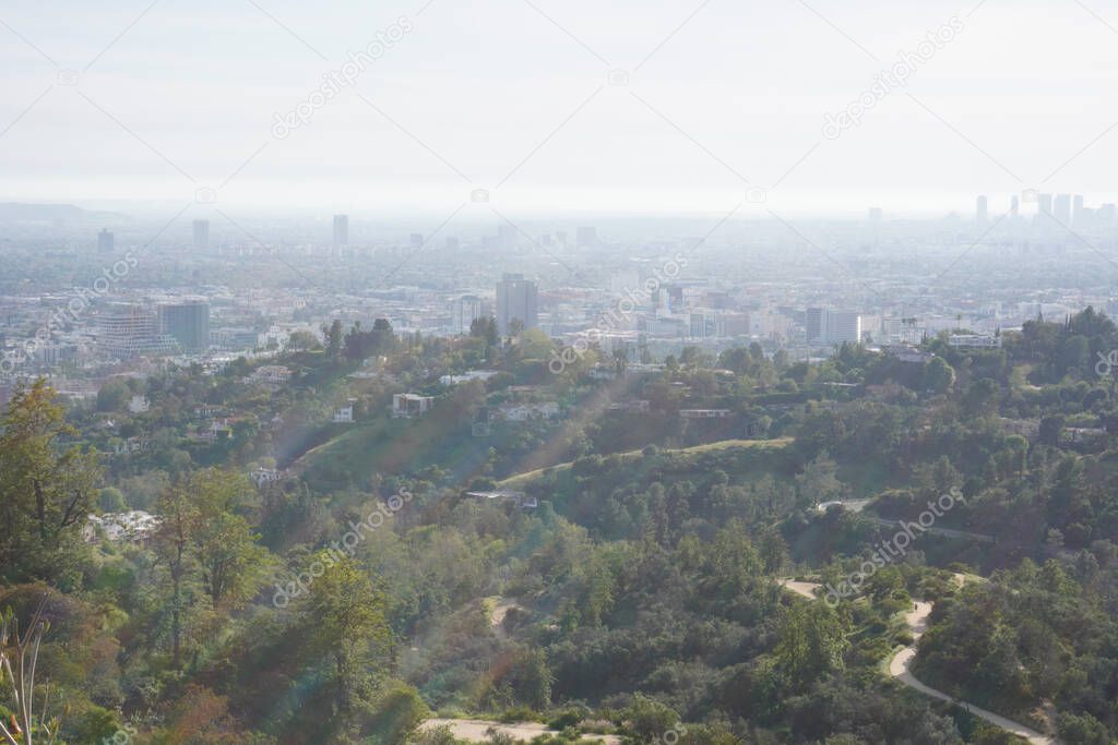 View of Los Angeles hills,  roads between hills and cityscape