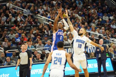 Orlando Magic 27 Aralık 2019 Cuma günü Orlando, Florida 'daki Amway Arena' da Philadelphia 76ers 'a ev sahipliği yapıyor..