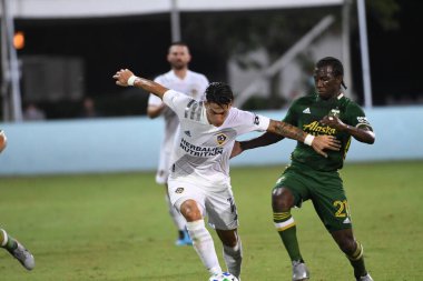 Los Angeles Galaksisi, 14 Temmuz 2020 'de Orlando Florida ABD' deki ESPN Vahşi Spor Dünyası 'nda düzenlenen MLS Sırt Turnuvası sırasında Portland Timbers ile karşı karşıya geldi..