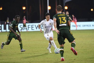 Los Angeles Galaksisi, 14 Temmuz 2020 'de Orlando Florida ABD' deki ESPN Vahşi Spor Dünyası 'nda düzenlenen MLS Sırt Turnuvası sırasında Portland Timbers ile karşı karşıya geldi..
