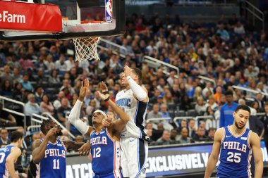 Orlando Magic 27 Aralık 2019 Cuma günü Orlando, Florida 'daki Amway Arena' da Philadelphia 76ers 'a ev sahipliği yapıyor..