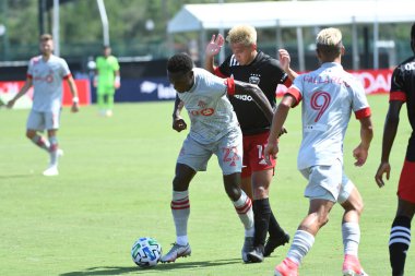 Toronto FC, 13 Temmuz 2020 tarihinde Orlando Florida 'daki ESPN Wild World of Sports' ta düzenlenen MLS Back Tournament sırasında D.C. United ile karşılaştı. Fotoğraf: Marty Jean-Louis
