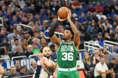 Boston Celtics oyuncusu Marcus Smart # 36, 24 Ocak 2020 Cuma günü Orlando, Florida 'da Amway Center' da üç sayı attı. 