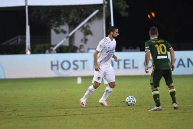 Los Angeles Galaksisi, 14 Temmuz 2020 'de Orlando Florida ABD' deki ESPN Vahşi Spor Dünyası 'nda düzenlenen MLS Sırt Turnuvası sırasında Portland Timbers ile karşı karşıya geldi.