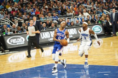 Orlando Magic 27 Aralık 2019 Cuma günü Orlando, Florida 'daki Amway Arena' da Philadelphia 76ers 'a ev sahipliği yapıyor..