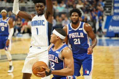 Orlando Magic 27 Aralık 2019 Cuma günü Orlando, Florida 'daki Amway Arena' da Philadelphia 76ers 'a ev sahipliği yapıyor..