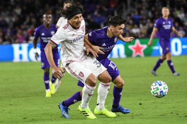 Orlando City SC oyuncusu Mauricio Pereyra # 10 ve Real Salt Lake oyuncusu Marcelo Silva # 30 numaralı maç 29 Şubat 2020 tarihinde Exploria Stadyumu 'nda oynanmıştır.. 