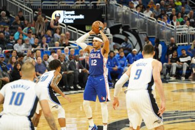 Orlando Magic 27 Aralık 2019 Cuma günü Orlando, Florida 'daki Amway Arena' da Philadelphia 76ers 'a ev sahipliği yapıyor..