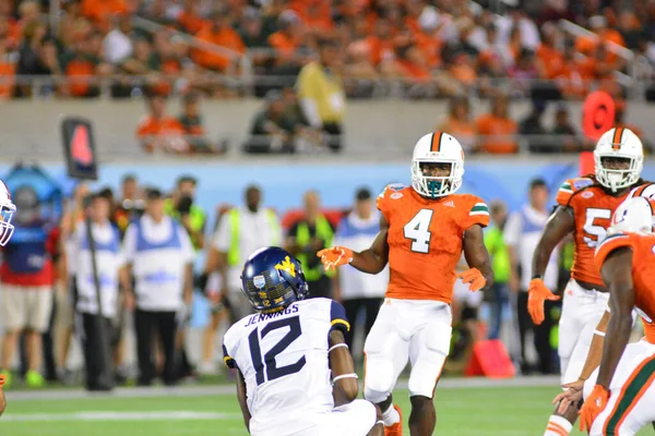 West Virginia Mountaineers Enfrentam Miami Hurricanes Durante 71St Russell Bowl — Fotografia de Stock