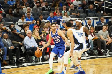 Orlando Magic 27 Aralık 2019 Cuma günü Orlando, Florida 'daki Amway Arena' da Philadelphia 76ers 'a ev sahipliği yapıyor..