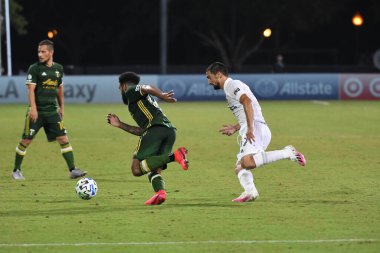 Los Angeles Galaksisi, 14 Temmuz 2020 'de Orlando Florida ABD' deki ESPN Vahşi Spor Dünyası 'nda düzenlenen MLS Sırt Turnuvası sırasında Portland Timbers ile karşı karşıya geldi..