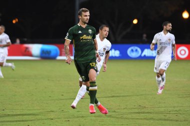 Los Angeles Galaksisi, 14 Temmuz 2020 'de Orlando Florida ABD' deki ESPN Vahşi Spor Dünyası 'nda düzenlenen MLS Sırt Turnuvası sırasında Portland Timbers ile karşı karşıya geldi..