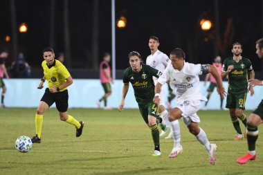 Los Angeles Galaksisi, 14 Temmuz 2020 'de Orlando Florida ABD' deki ESPN Vahşi Spor Dünyası 'nda düzenlenen MLS Sırt Turnuvası sırasında Portland Timbers ile karşı karşıya geldi..