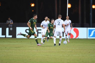 Los Angeles Galaksisi, 14 Temmuz 2020 'de Orlando Florida ABD' deki ESPN Vahşi Spor Dünyası 'nda düzenlenen MLS Sırt Turnuvası sırasında Portland Timbers ile karşı karşıya geldi.