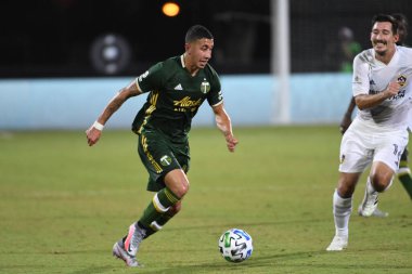 Los Angeles Galaksisi, 14 Temmuz 2020 'de Orlando Florida ABD' deki ESPN Vahşi Spor Dünyası 'nda düzenlenen MLS Sırt Turnuvası sırasında Portland Timbers ile karşı karşıya geldi.
