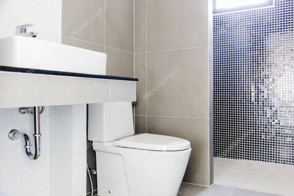 Modern design home bathroom toilet and sink White colur sanitary ware in the bathroom