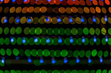 Soyut bokeh turuncu yeşil kırmızı renkli renkli ışıklar