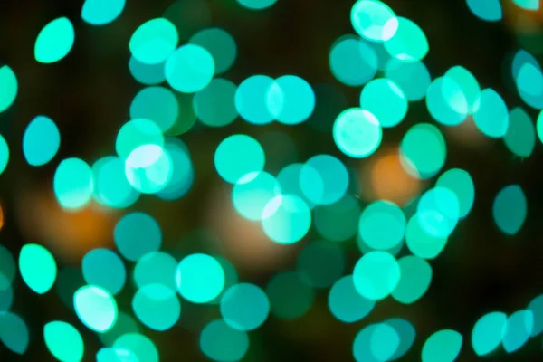 Abstract bokeh lights orange green red colorful background