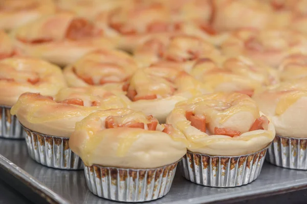 Baked white bread Ham and cheese bake in tray bakery.