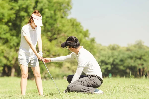 Asian Couple Playing Golf Man Teaching Woman Play Golf While — Stock Photo, Image
