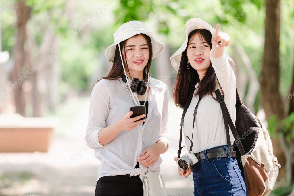 Asian young girls and friends Traveler in city