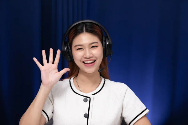Camera View Happy Young Asian Business Woman Wears Headset Talk — Fotografia de Stock