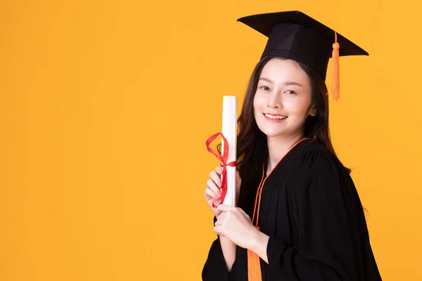 Happy Graduate Asian Woman Cap Gowm Holding Certificated Diploma Yellow — Stok Foto