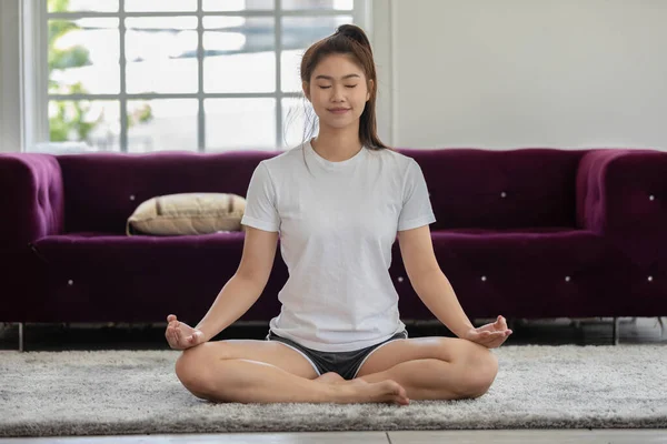 Attractive Asian Woman Practice Yoga Lotus Pose Meditation Home Room — Stok Foto