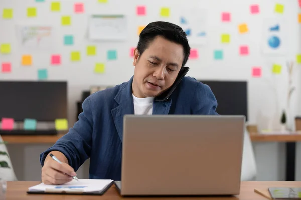 Asian Senior Business Man Casual Working Laptop Talking Customer Mobile — Stock Photo, Image