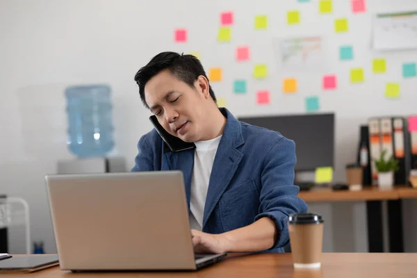 Asian Senior Business Man Casual Working Laptop Talking Customer Mobile — Stock Photo, Image