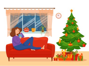 Genç kadın koltukta oturup kitap okuma.